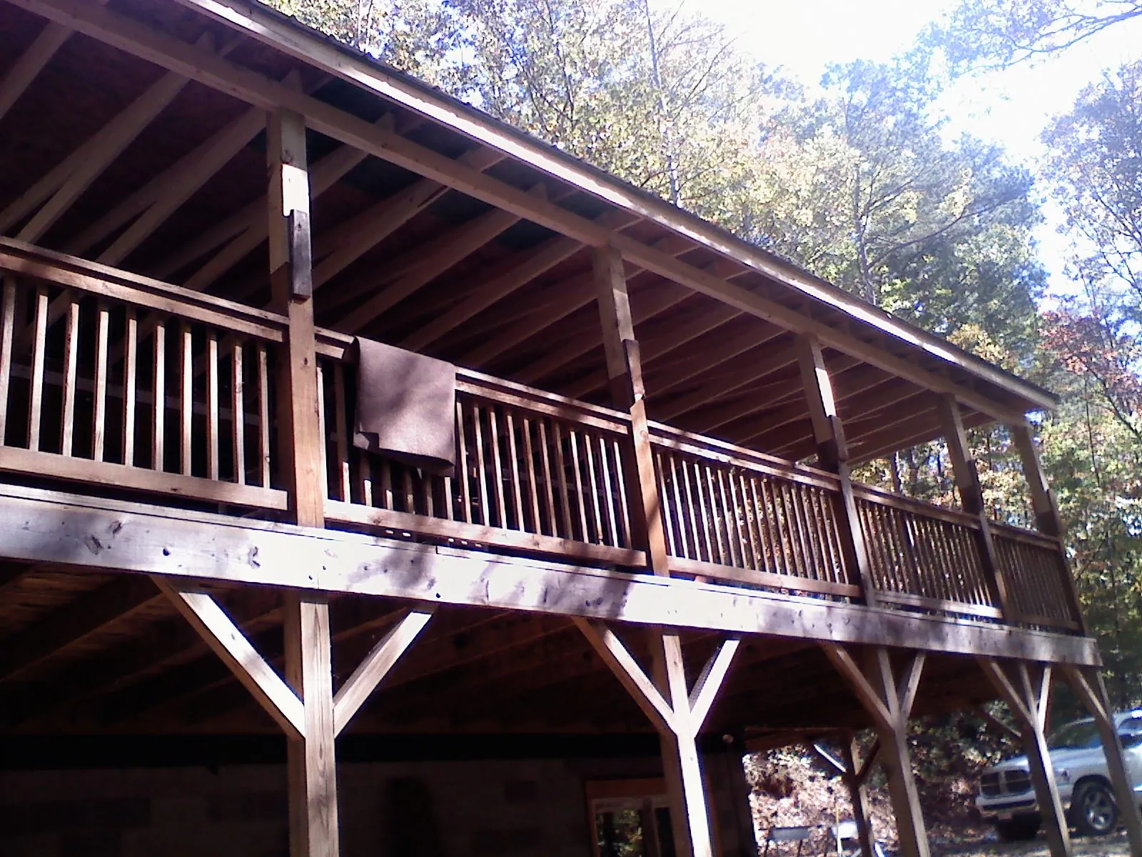 Timber framing under a new elevated porch and deck — Roof Leak Repair in Waterbury by Roofing Brothers